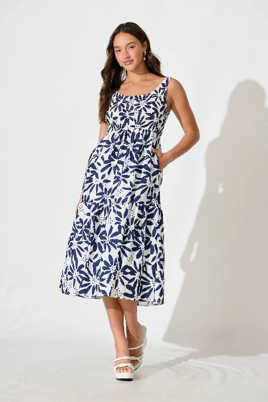 The Sale You’ve Been Waiting For!Caribbean Midi Dress In White with Navy Flower