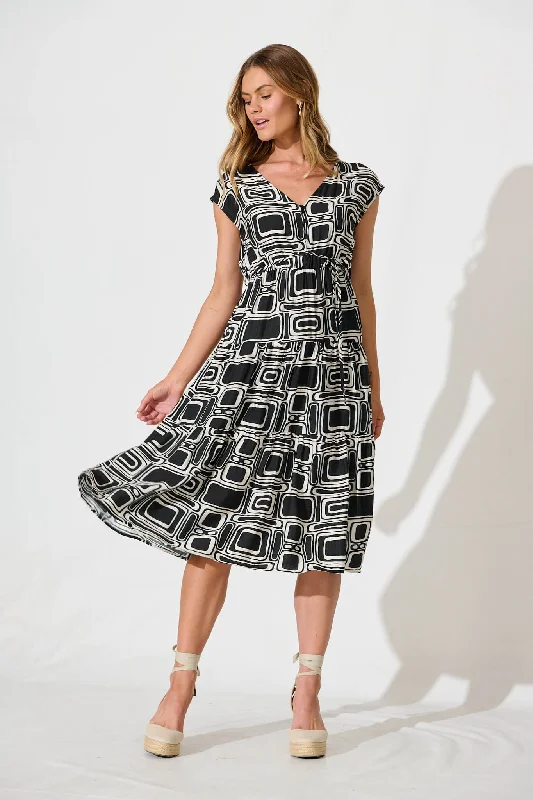 Hurry! While Supplies Last!Dixie Midi Dress In Black And Cream Geometric