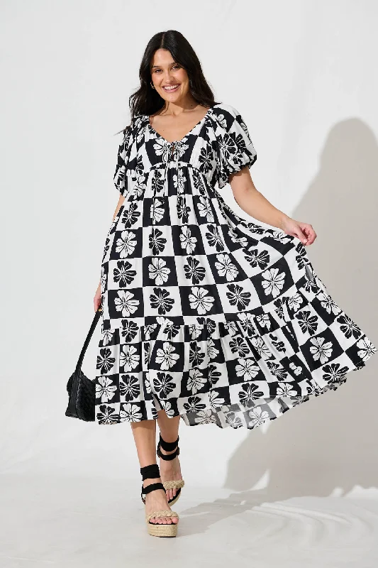 Exclusive Deals Just for You!Marchena Midi Dress in Black and White Flower Print