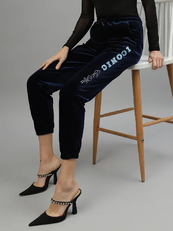 Unlock Huge Savings Now!Iconic Women Navy Blue Solid Regular Fit Mid-Rise Trackpant